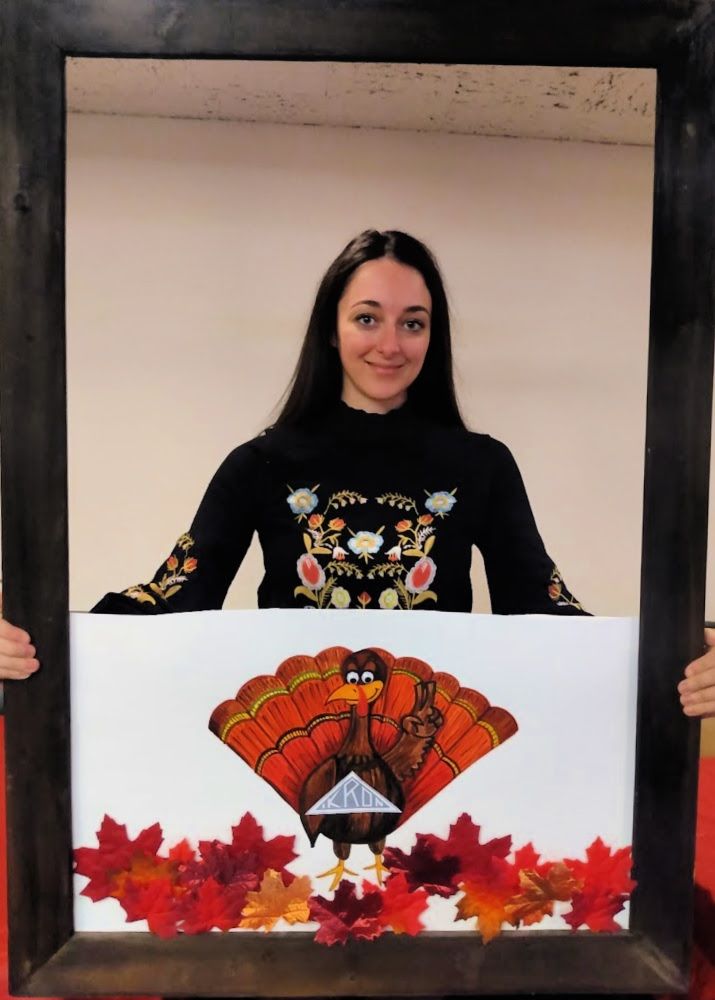 Raelyn holding Turkey IKRON art